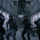 A bunch of MCU guards holding the X-Men hostage.